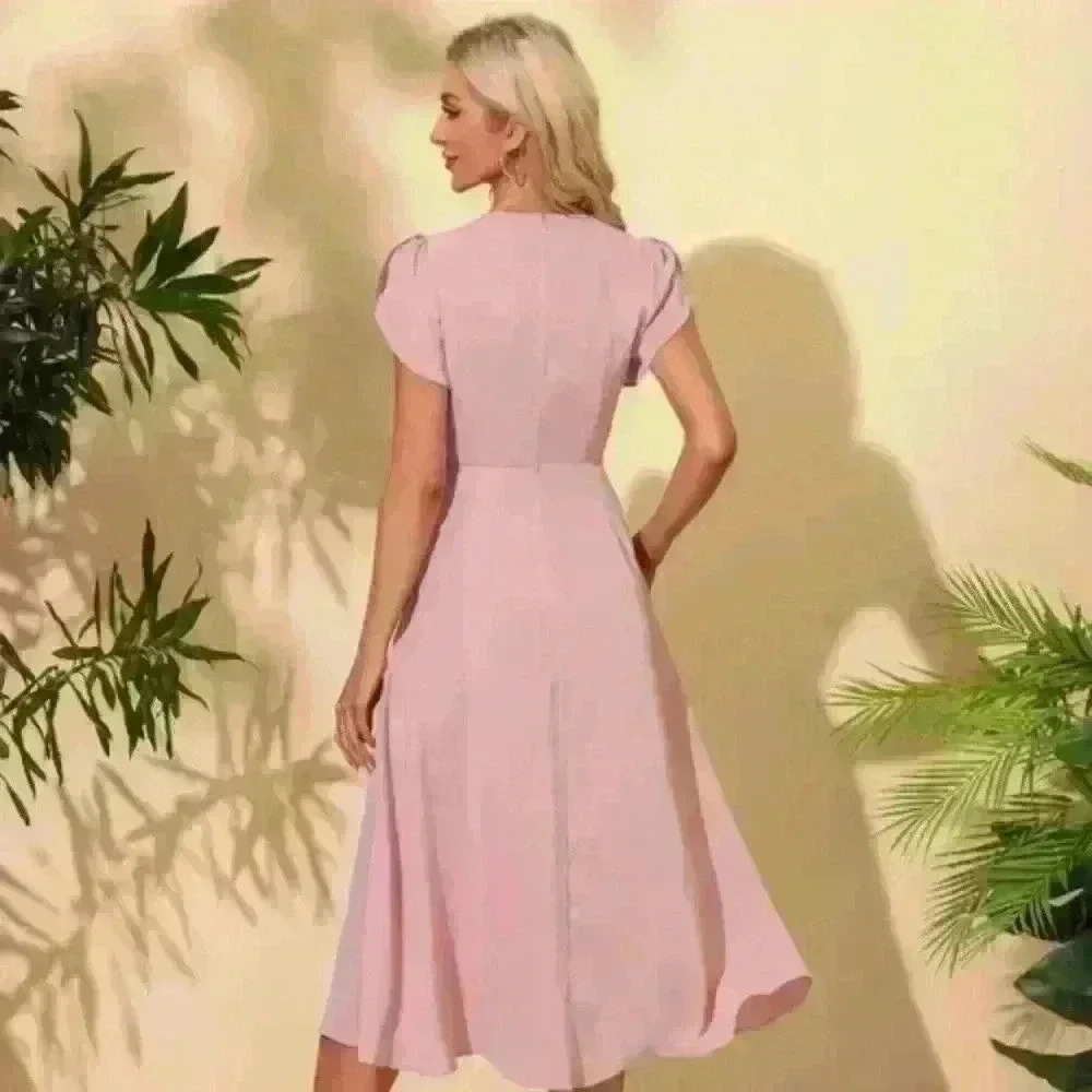 A line scoop neck dress. Light pink. Brand new with tags.